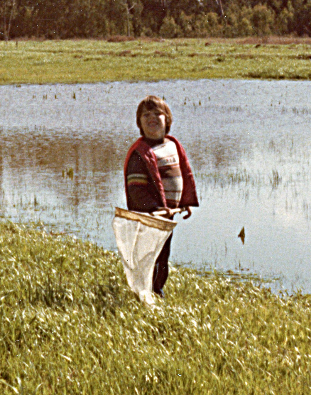 1977-00-00 Jason Reto with butterfly net at marsh